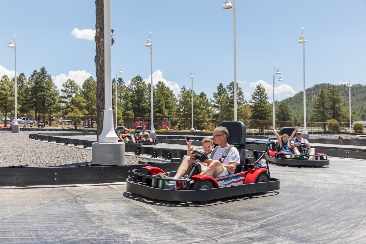 Go-karts lined up at an outdoor track in Arizona